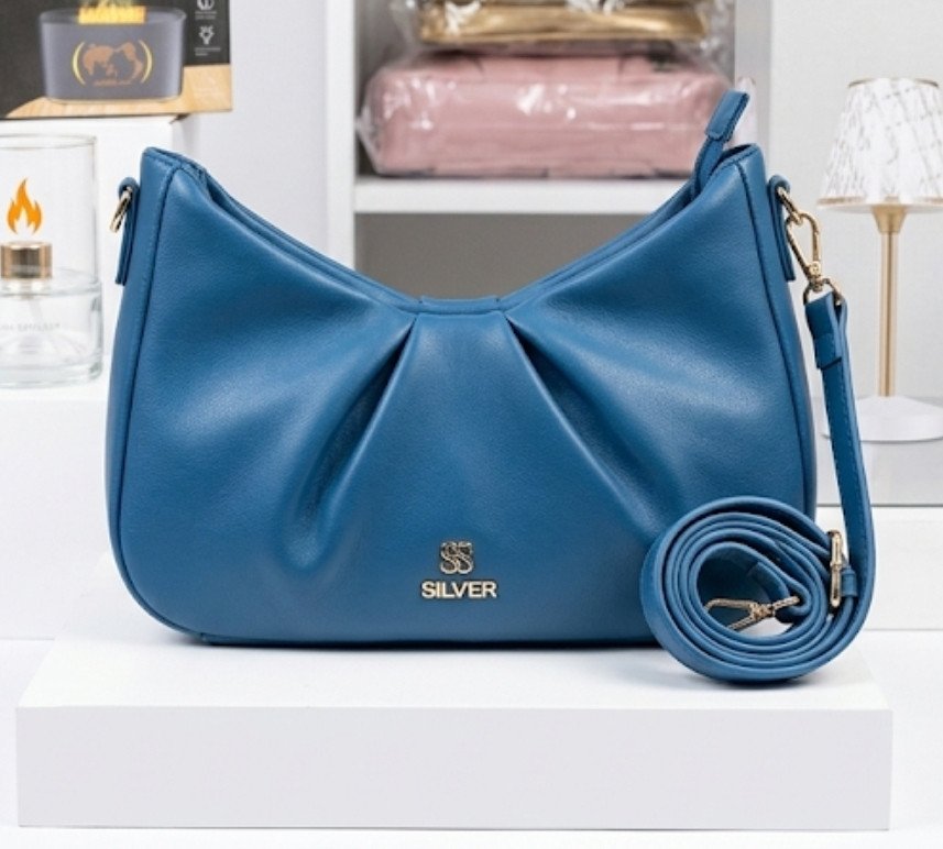 Teal blue hobo-style handbag